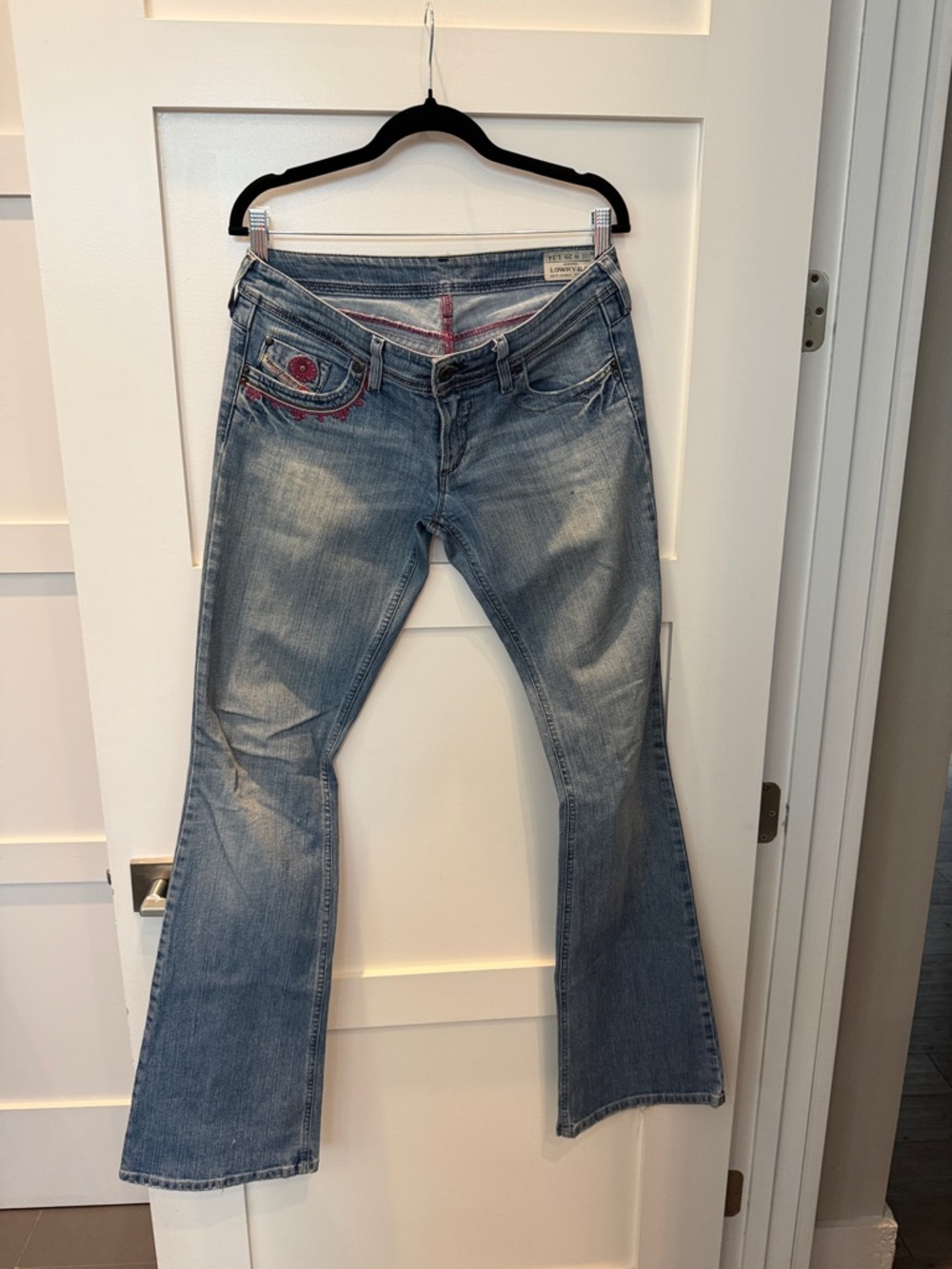 Light Blue Flare Jeans with Embroidered Pocket - Brand Unknown